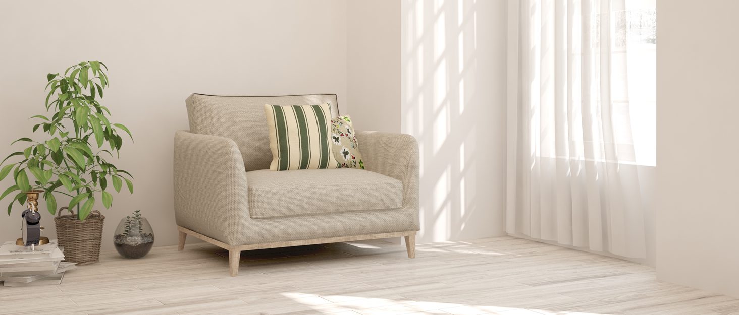 Bright living room with an armchair by the window